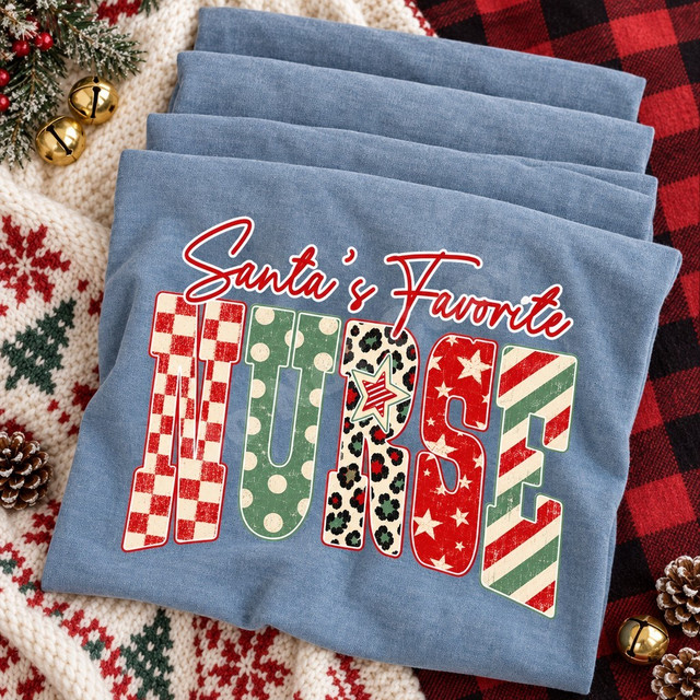 Santa's Favorite Nurse Christmas DTF transfer with script lettering and block letters in buffalo check, polka dot, leopard print, star, and candy stripe patterns Shown on a Chambray t-shirt.