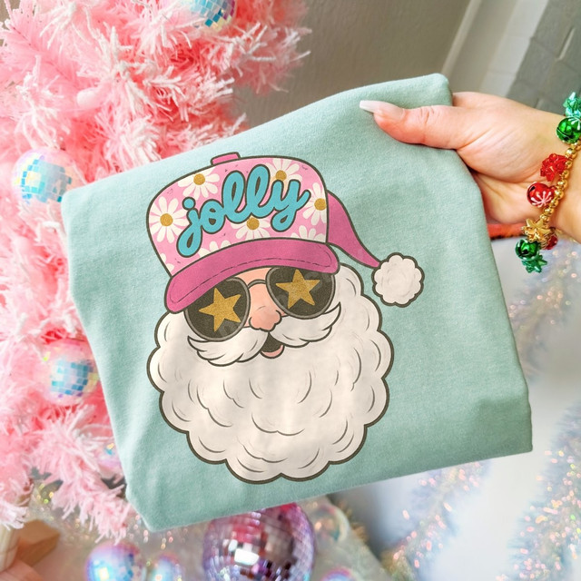 Jolly Santa DTF transfer with pink daisy trucker hat, star sunglasses, and fluffy white beard on a Christmas shirt