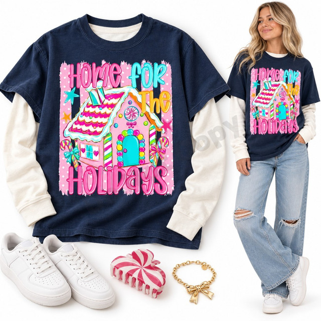 Home For The Holidays DTF transfer with colorful bubble lettering and a candy-coated gingerbread house on a pink polka-dot background Shown on a Navy t-shirt.