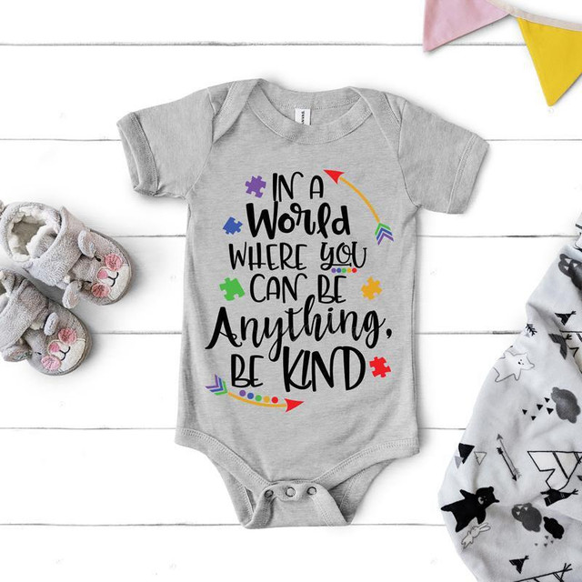 Be Kind Autism Awareness Infant Screen Print Heat Transfer, grey baby onesie with colorful puzzle pieces and inspirational quote.