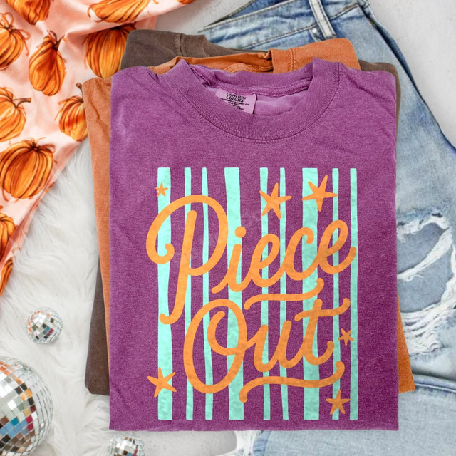 Piece Out retro script DTF transfer in orange with mint green stripes and star accents on a purple shirt