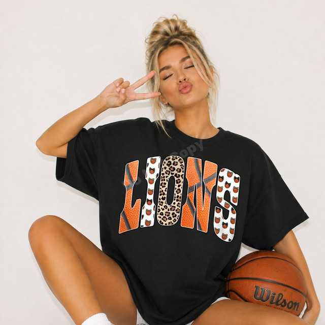 Lions basketball DTF transfer with leopard print and basketball pattern lettering on a black shirt