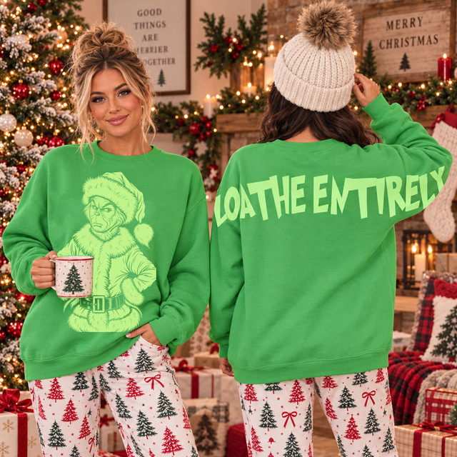 Green Christmas sweatshirt with large holiday character front transfer and oversized Loathe Entirely back design spanning the upper back and sleeves