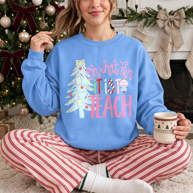 Oh What Fun It Is To Teach Christmas DTF transfer with hand-lettered pink script and a tree made of pencils, scissors, and school supplies