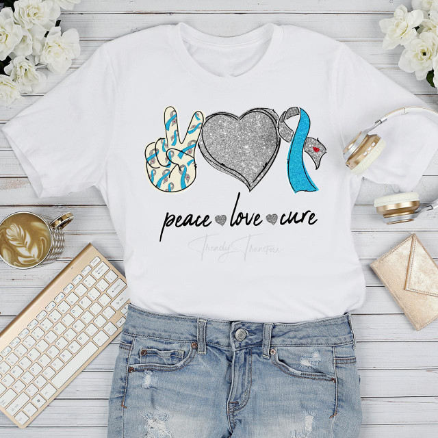 Blue and silver Diabetes Awareness Glitter Heart Peace Love Cure Sublimation Transfer, featured on a white T-shirt with peace, love, and cure symbols.