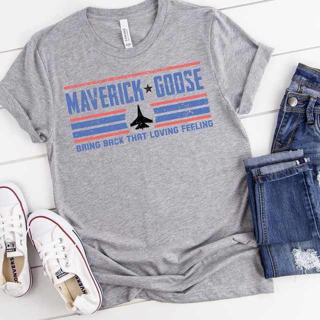 Top Gun You've Lost That Loving Feeling Screen Print Heat Transfer t-shirt, gray casual short sleeve shirt with Maverick and Goose design in patriotic colors, paired with jeans and white Converse sneakers.
