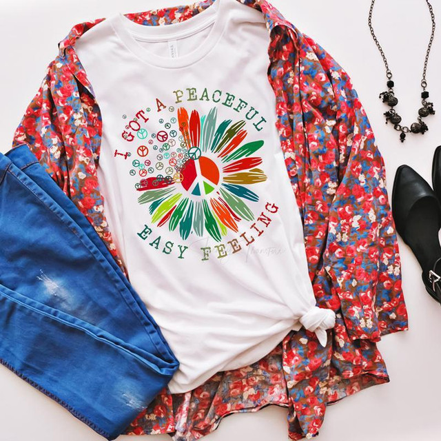 I Got A Peaceful Easy Feeling Sublimation Transfer, colorful t-shirt with peace sign and floral design for a cheerful, relaxed style.