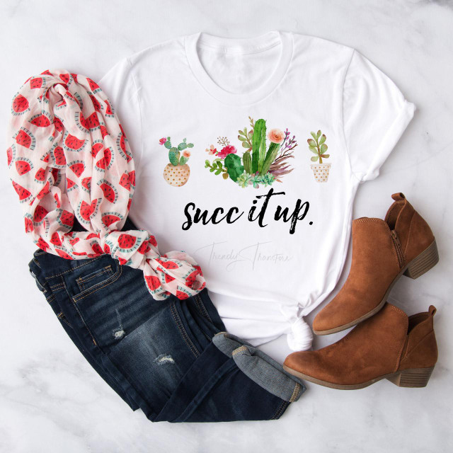 Succ it up cacti cactus succulent floral humor sublimation transfer t-shirt, with a design featuring cacti and succulents and the phrase 'succ it up.'