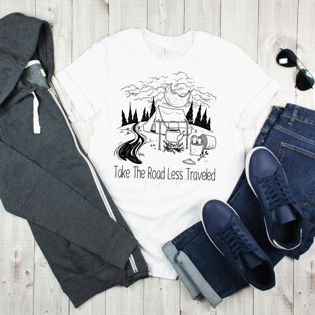 Take the Road Less Travelled Camping Travel Sublimation Transfer T-shirt with outdoor camping illustration of a tent, trees, moon, river, and camping gear