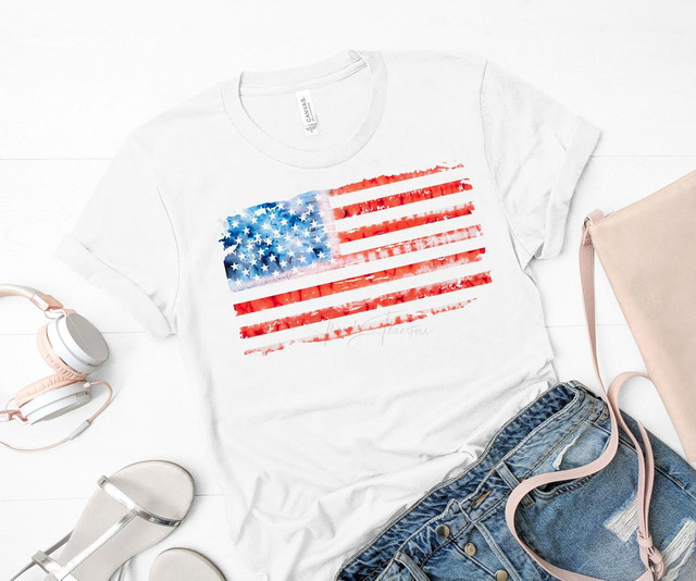 Tie dye flag USA Patriotic Sublimation Transfer, white T-shirt featuring a colorful American flag design with tie dye effects.