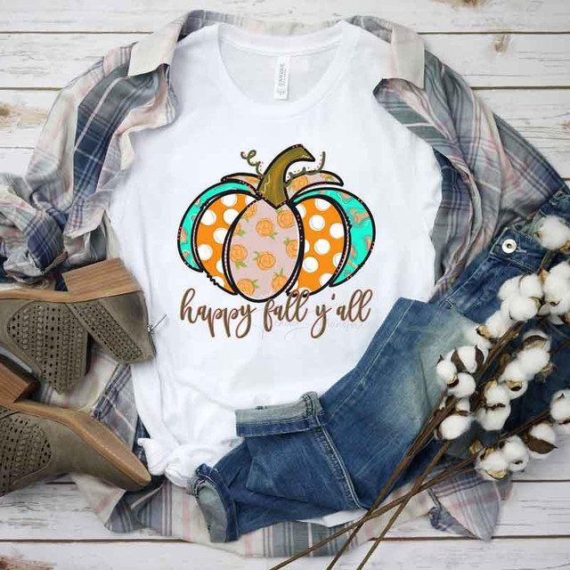 Happy Fall Y'all Sublimation Transfer, pumpkin design with orange, teal, and polka dot patterns on a white t-shirt with casual fall outfit accessories.