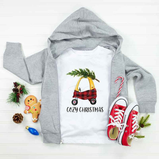 Cozy Christmas Sublimation Transfer, Christmas holiday design featuring a sleigh with a Christmas tree and the text 'Cozy Christmas' on a white t-shirt.