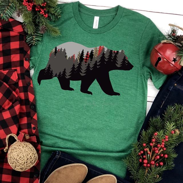Blank Bear Screen Print Heat Transfer, a graphic of a bear silhouette filled with a forest and mountain scene on a green t-shirt.