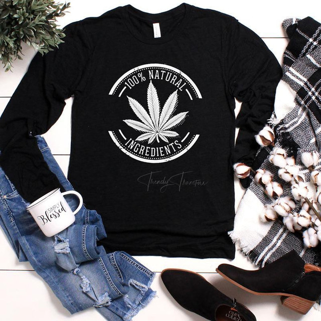 100% Natural Ingredients Screen Print Heat Transfer, black sweatshirt with a white cannabis leaf design and text