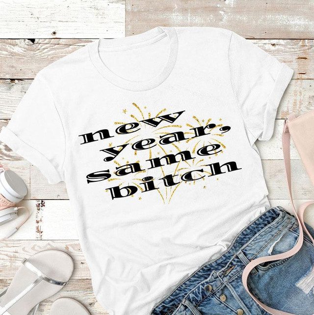 New Year, Same Bitch Sublimation Transfer T-shirt with firework design and bold black text on white fabric.