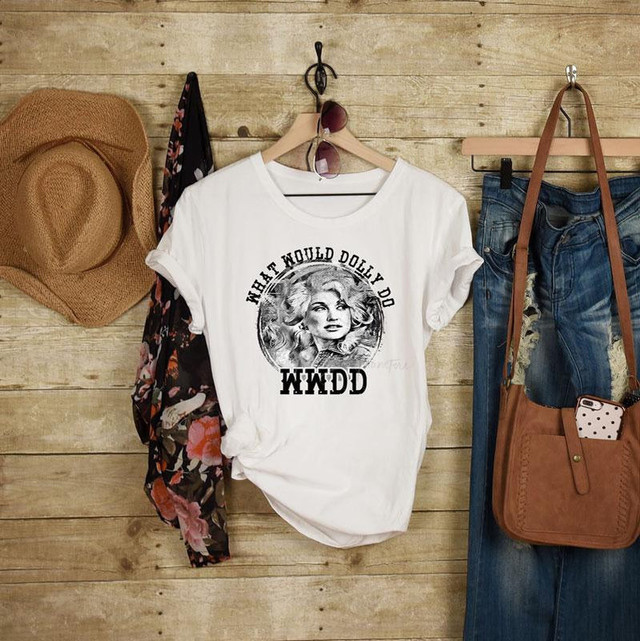 WWDD Sublimation Transfer, white T-shirt with a Dolly Parton portrait and the text 'What Would Dolly Do'