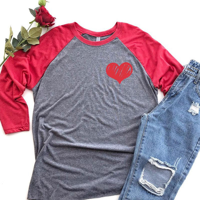 Red Heart Metallic HAT/POCKET Screen Print Heat Transfer on a casual grey and red raglan T-shirt with ripped jeans and a rose, lifestyle use.