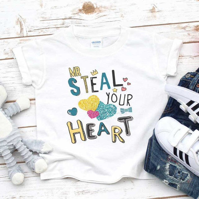 Mr Steal Your Heart Sublimation Transfer, white T-shirt with colorful heart and text design for personalized printing.