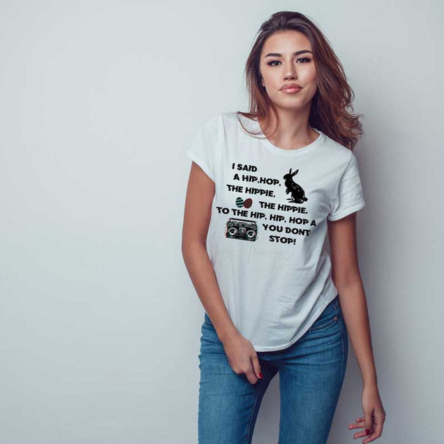 I Said A Hip Hop Sublimation Transfer, a woman wearing a white T-shirt with the sublimation transfer design featuring graphics and text related to hip hop culture.