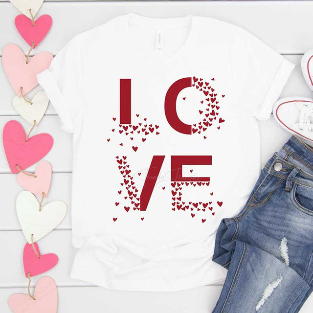 Love Hearts Sublimation Transfer, white T-shirt with red love-themed graphic design featuring the word 'LOVE' with heart shapes.