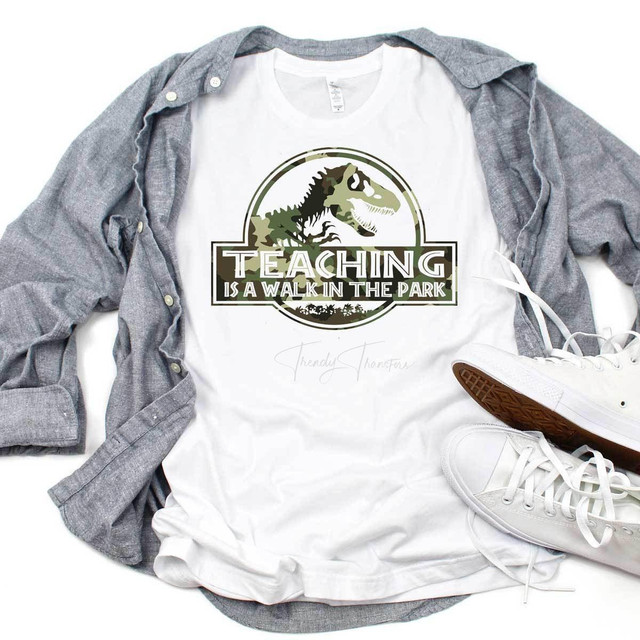 Teaching Is A Walk In The Park Camo Print Sublimation Transfer, t-shirt with dinosaur and camouflage design with text.