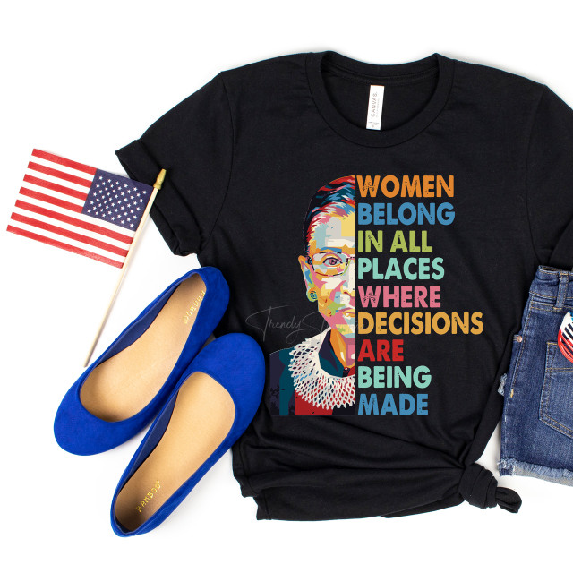Women Belong Where Decisions Are Made DTF Heat Transfer, colorfully designed statement graphic on a black T-shirt featuring a stylized portrait of Ruth Bader Ginsburg.