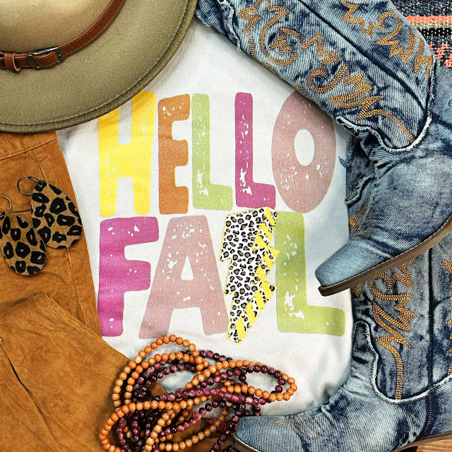 Hello Fall Lightening Bolt Screen Print Heat Transfer, colorful fall-themed design with a lightning bolt and distressed texture on a white background surrounded by fashion accessories and clothing.