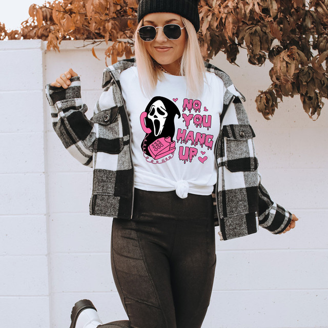 No You Hang Up Horror DTF Transfer, a graphic t-shirt featuring a ghostly phone receiver with a scream mask design and pink text 'No You Hang Up' surrounded by hearts.