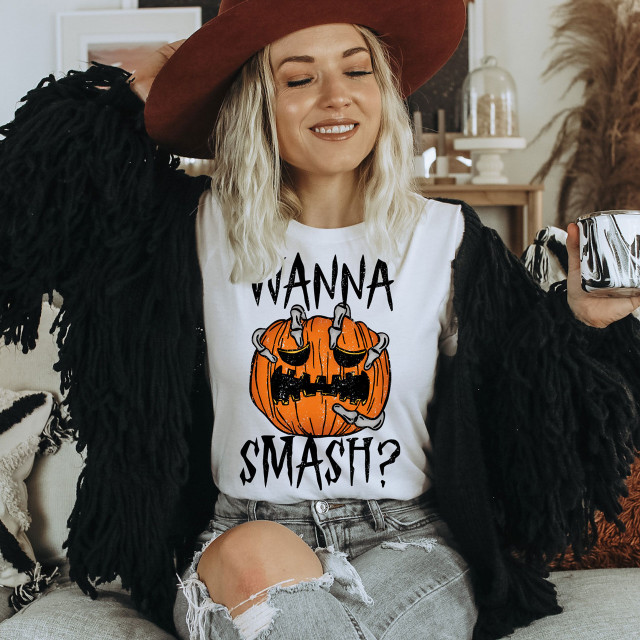 Wanna Smash Pumpkin Screen Print Heat Transfer, a Halloween-themed graphic design featuring a cartoon pumpkin with a spooky face.