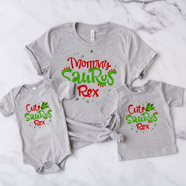 Cute-a-saurus Rex Dinosaur DTF Transfer, family matching gray T-shirts with colorful dinosaur and text design for moms and kids.