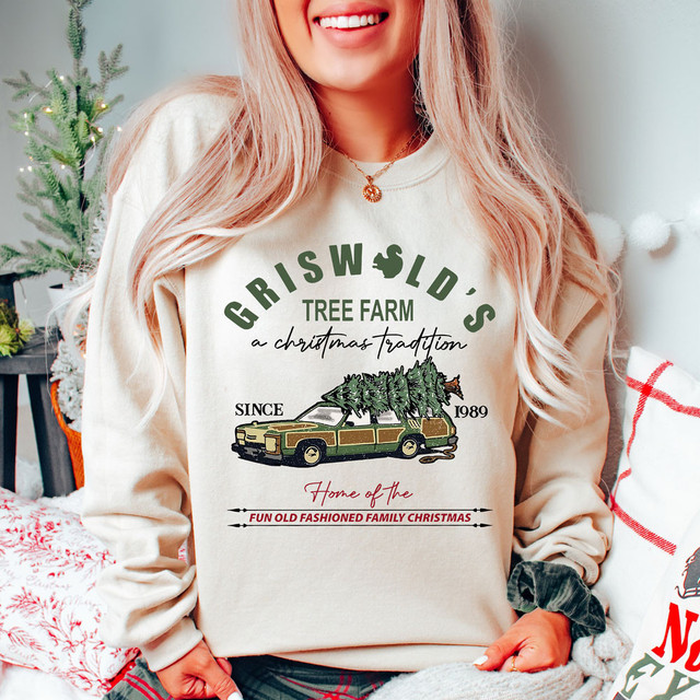 Product Christmas Tree Farm Griswold DTF Heat Transfer, a festive design featuring a tree loaded on a vehicle with holiday text and references to Christmas traditions.