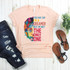 Lennon You May Say I'm a Dreamer Subway Art Pop Art Fan Art Sublimation Transfer T-shirt with colorful abstract portrait of John Lennon and inspirational quote on a light pink background