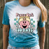 Peace Out 100 Days DTF Heat Transfer, colorful cartoon pig wearing a beanie with a peace sign, peace symbol hands, and text celebrating 100 days.