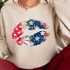 USA Star Lips DTF Heat Transfer, image of a sweatshirt with a colorful star and fireworks design in a lips shape printed on the front.