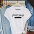 Freestyling This Whole Mom Thing DTF Heat Transfer, white T-shirt with black script text and black box design, displayed on a hanger among denim and casual clothes.