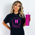 Melting Face PINK DTF Heat Transfer, pink melting face design on a woman's black t-shirt.