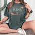 Mama Bullhead DTF Heat Transfer, embroidered on a dark gray T-shirt in a woman modeling the product.