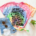 Let Them Misunderstand You DTF Heat Transfer, colorful tie-dye T-shirt with inspirational quote and heart graphics.