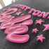 Honkey Tonk Doll PUFF Screen Print Heat Transfer, pink and peach-colored Puffy Heat Transfer design on black fabric.