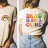 Support Drag DTF Heat Transfer, colorful graphic design on a beige t-shirt.