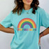 Support Drag DTF Heat Transfer, colorful rainbow with support drag text on a turquoise T-shirt.
