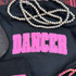 Dancer Pink Youth Screen Print Heat Transfer, pink outline text design on black fabric.