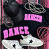 Dancer Pink Youth Screen Print Heat Transfer, black t-shirts with pink DANCER heat transfer design, paired with gray and black sneakers, pink and gray pearl necklaces, and a black cap with glitter, on a pink and black striped background.