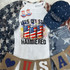 Let's Get Star Spangled Hammered DTF Heat Transfer, patriotic-themed graphic with cans decorated in American flag pattern and fireworks in the background.