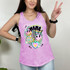 Mama Retro Collage DTF Heat Transfer, colorful colorful graphic design on a pink tank top, featuring a smiling face, peace signs, a butterfly, a disco ball, and the word 'Mama'