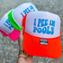I Pee In Pools Hat/Pocket Neon Blue Screen Print Heat Transfer, vibrant orange trucker cap with bold blue text 'I PEE IN POOLS' on white background.