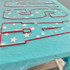 USA Stars PUFF Screen Print Heat Transfer, pink outline American flag with white stars on a light blue fabric background.