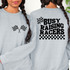 Racing Flags DTF Heat Transfer, T-shirt with racing flags graphic on front and 'Busy Raising Racers' text on back.