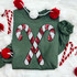 Sequins Candy Canes Patch, green sweatshirt with red and white candy cane sequins design.