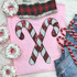Sequins Candy Canes Patch, red and white sequin candy cane embroidered patch on pink fabric.